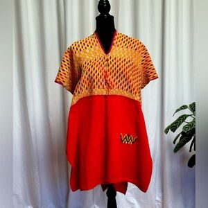 Handmade poncho from Guatemala. Mid-heavy weight woven fabric. Open sides. OS